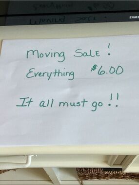 Handwritten Moving Sale Sign in Green Ink